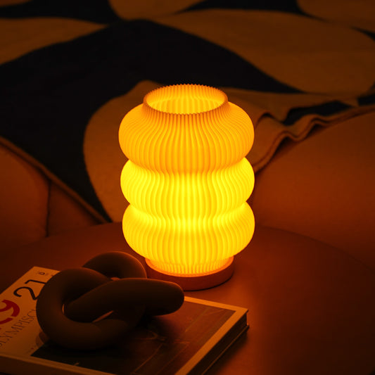 Minimalistische Tischleuchte aus recyceltem Bioplastik mit dimmbarem LED-Leuchtmittel